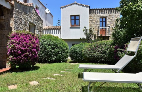 Lotzorai Apartment | Villa Menhir. Mediterranean garden. Mountain view.