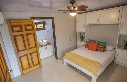 Barrio Pilo Villa | Villa Palmera es un Espacio Acogedor con Amplios Jardines, Piscina, Rancho BBQ