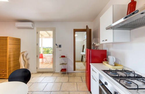 Capilungo Villa | Villa 'Rilù - Sole Rosso' with Shared Pool, Wi-Fi and Air Conditioning