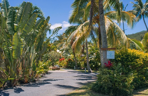 Arorangi Villa | Villa RUA lower floor of colonial style villa set in tropical gardens with pool