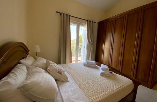 Archangelos Villa | Villa Sofia with garden, pool and lounge areas
