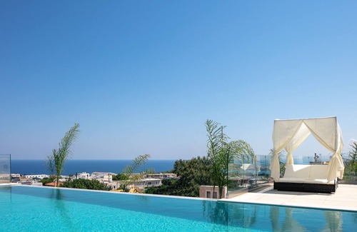 Violi Charaki Villa | Villa Sorin - stunning views, hot tub, 50m2 pool, walking distance to shops!