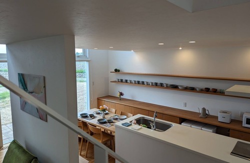 Naganuma House | Villa with glass atrium living room/Yubari-gun Hokkaidō