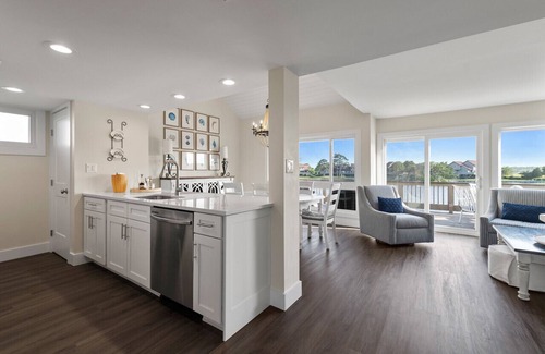 Litchfield by the Sea House | Villa with lake views and pool access located within gated Litchfield By the Sea community.
