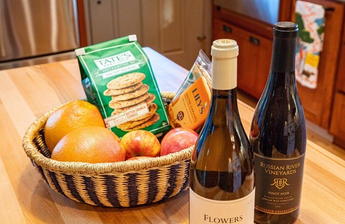 Graton House | Vineyard property with a 1910 Farmhouse and Water Tower