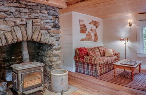 Chimney Rock House | Vintage and charming cabin with stone fireplace
