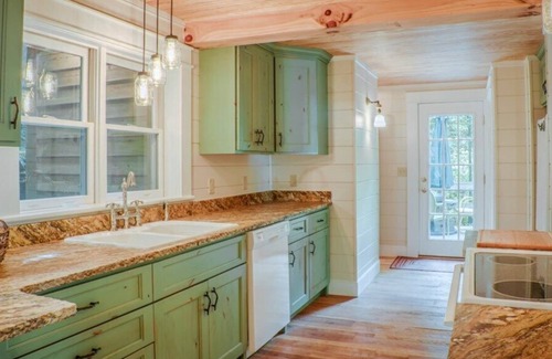 Chimney Rock House | Vintage and charming cabin with stone fireplace