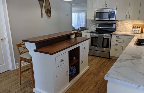 Bracebridge Cottage | Vintage Boho River-Front Cottage in Muskoka