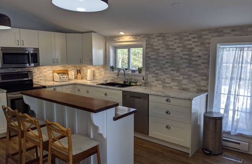 Bracebridge Cottage | Vintage Boho River-Front Cottage in Muskoka