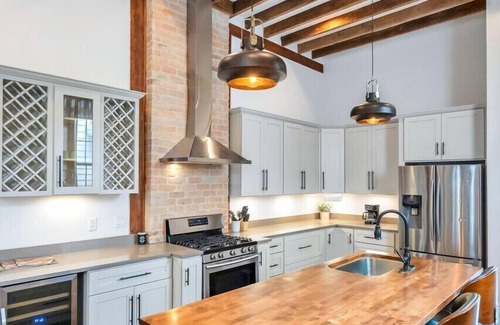 Esplanade Ridge House | Vintage Elegance in NOLA: 3BR, Patio, Arcade Room Bliss