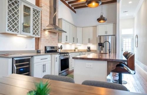 Esplanade Ridge House | Vintage Elegance in NOLA: 3BR, Patio, Arcade Room Bliss
