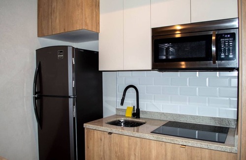 Cerritos Apartment | Vista de playa y alberca de lujo