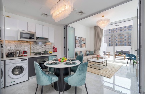 Discovery Gardens Apartment | Vogue Elegance at Pearlz near Metro