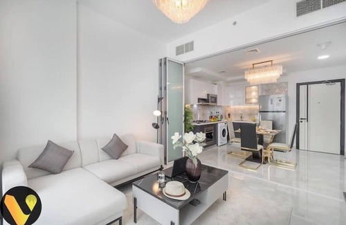 Discovery Gardens Apartment | Vogue Elegance at Pearlz near Metro