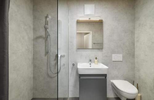Dornbirn Apartment | VORALIVING - Modernes Neubau Apartment Toplage - Perfekt für Business & Urlaub - WLAN, 24 7 Check-in