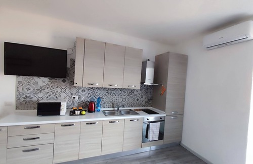 Limonta Apartment | Vrbo Property
