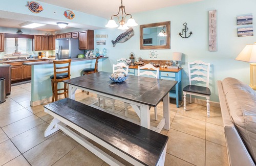 Ono Island Condo | VRBO Rated #1 Sandy Key 424 Includes ground floor storage with chairs & umbrella