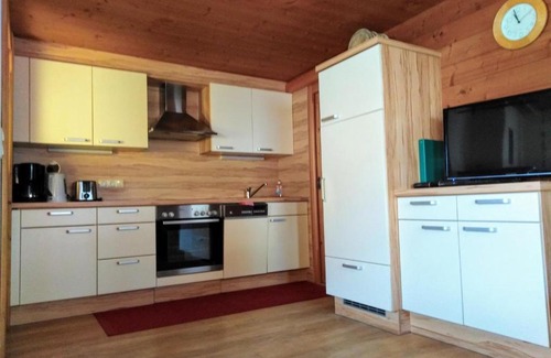 Alpbach House | Wörglerhof's Hüttenapartments mit Kachelofen
