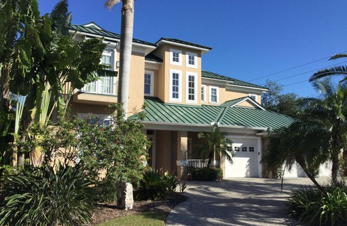 Vanderbilt Beach House | Walk or bike to the beach from this bright, airy 4BR waterfront home in Naples