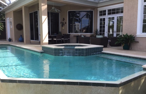 Vanderbilt Beach House | Walk or bike to the beach from this bright, airy 4BR waterfront home in Naples