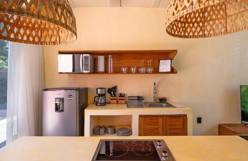 Bucerias Condo | Walk to Beach | Modern Design | Pool | Kitchen | Garden Oasis | Tranquil Setting