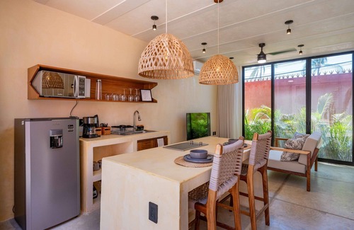 Bucerias Condo | Walk to Beach | Modern Design | Pool | Kitchen | Garden Oasis | Tranquil Setting