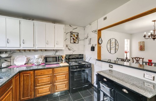 Royal Oak House | Walk to Detroit Zoo: Home w/Sunroom & Patio!
