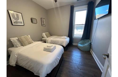 South Shore House | Walk to the Lake! Grill, Fireplace, Sleeps 12