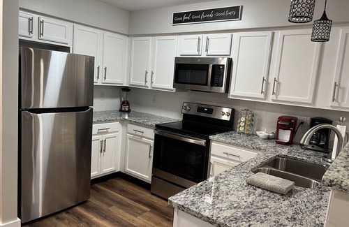 North Capitol Condo | Walking Distance to Broadway! Fully Renovated Condo on the River, Free Parking