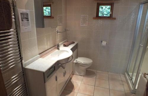Swanage House | Walnut Log Cabin