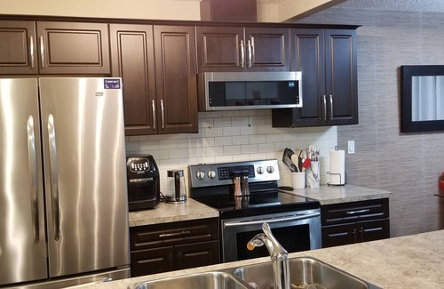 Southeast Edmonton House | Warm and cozy 2master bedrooms with free parking ,internet &close to the airport