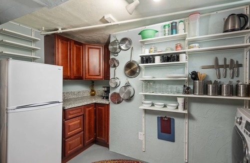 Madison South Condo | Warm and Cozy Basement, Covered Outdoor Area w/BBQ and Fire-Table, 6 Miles to Downtown