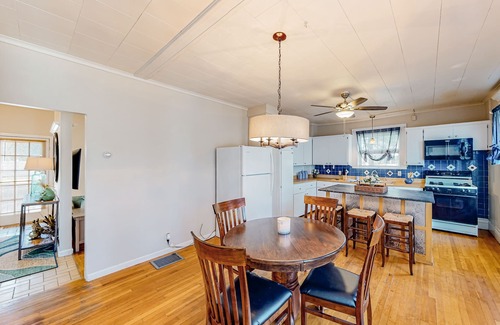 Colchester House | Warm & inviting retreat with a full kitchen, gas fireplace, & furnished patio