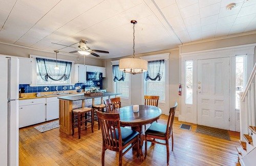 Colchester House | Warm & inviting retreat with a full kitchen, gas fireplace, & furnished patio
