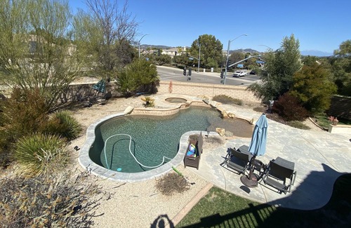 Murrieta House | Warm private bedroom & bathroom in luxurious home