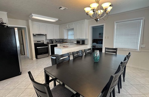 Bacliff House | Watch amazing sunsets from the 6 person hot tub & private 220’ pier.