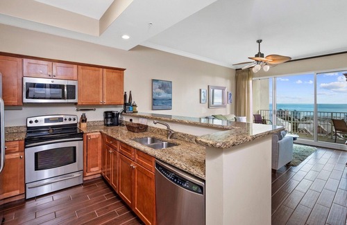 Fort Morgan Condo | Watch the Dolphins play from this 6th floor Fort Morgan Condo.