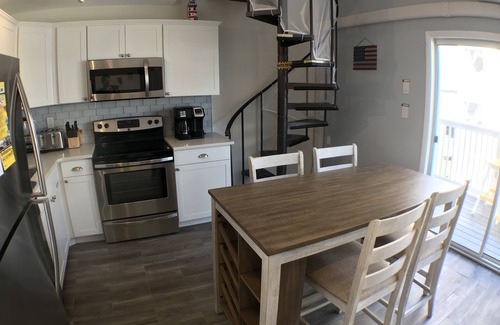 North Ocean City Condo | Watch the Waves and Relax. Steps from the Beach! Sunny & Breezy top floor unit.
