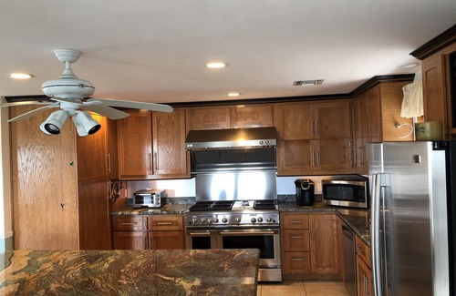 Breezeswept Beach Estates House | Water Front Home. Direct deep water access with private pool/spa/dock & Elevator