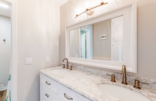 Perdido Key Coves One House | Water-view home with balcony & boat dock & tennis court access