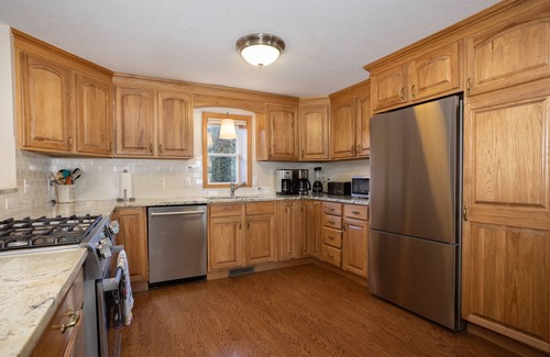 Lake Leelanau House | Water Views On Lake Leelanau! Cozy Fireplace and Open Kitchen Great for Holidays
