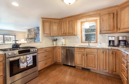 Lake Leelanau House | Water Views On Lake Leelanau! Cozy Fireplace and Open Kitchen Great for Holidays