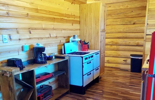 Grove Cabin | Waterfall View Cabin at White Buffalo Lodge;nFamily-friendly with lake access