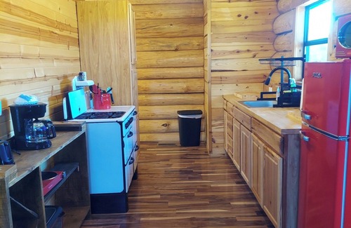 Grove Cabin | Waterfall View Cabin at White Buffalo Lodge;nFamily-friendly with lake access