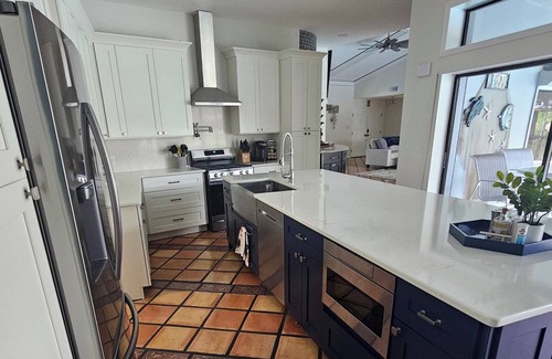 Riverhaven Village House | Waterfont, pool, private boat slip on site, sleeps 8. Plenty of space