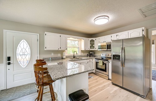 New London House | Waterfront Badin Lake Getaway: Boat Dock, Fire Pit
