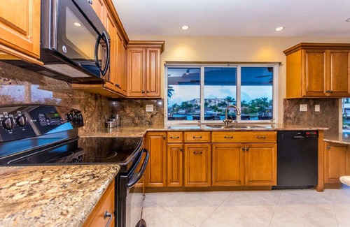 Garden Isles House | Waterfront - Beach, Heated Pool, Hot Tub, Kayak and SUP's