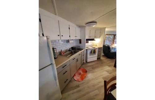 Satsuma Cottage | Waterfront Boat House updated mobile home - Work & Fish on 50 ft. Dock and slips