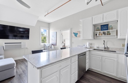 Elkhart Lake Condo | Waterfront Condo, Private Beach, Outdoor/Indoor Pools, & Walkable to Downtown