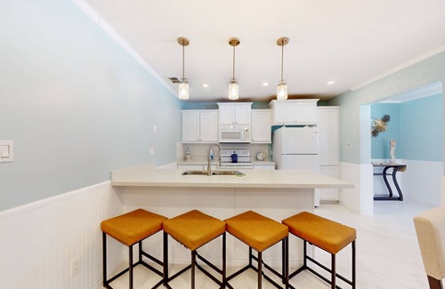 Port Isabel Condo | Waterfront condo with an outdoor pool, washer/dryer, & central AC